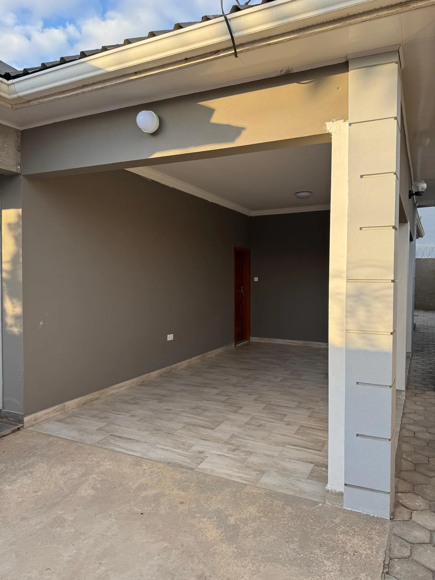 Exterior with covered driveway