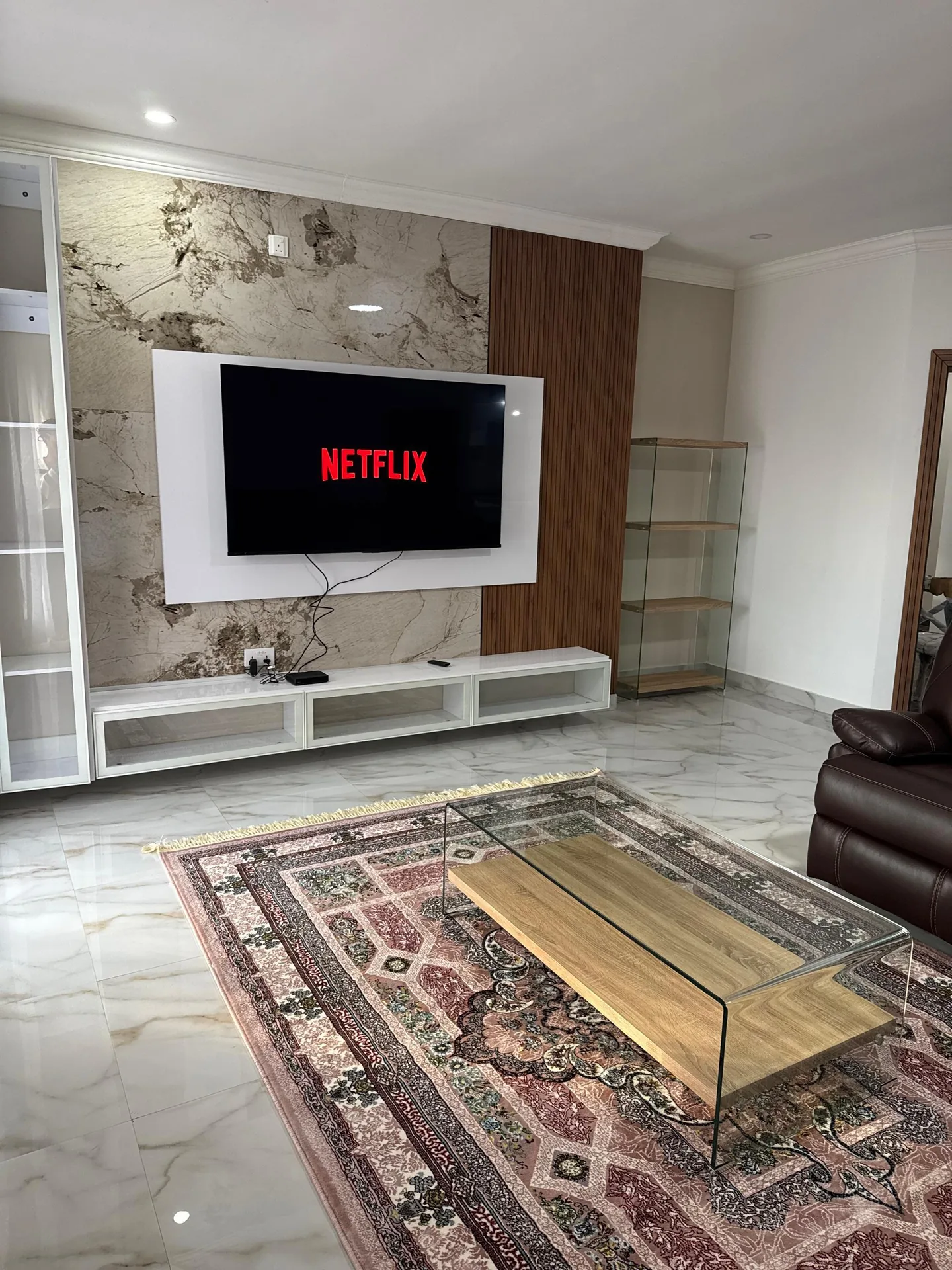 Common living room with 65-inch smart TV