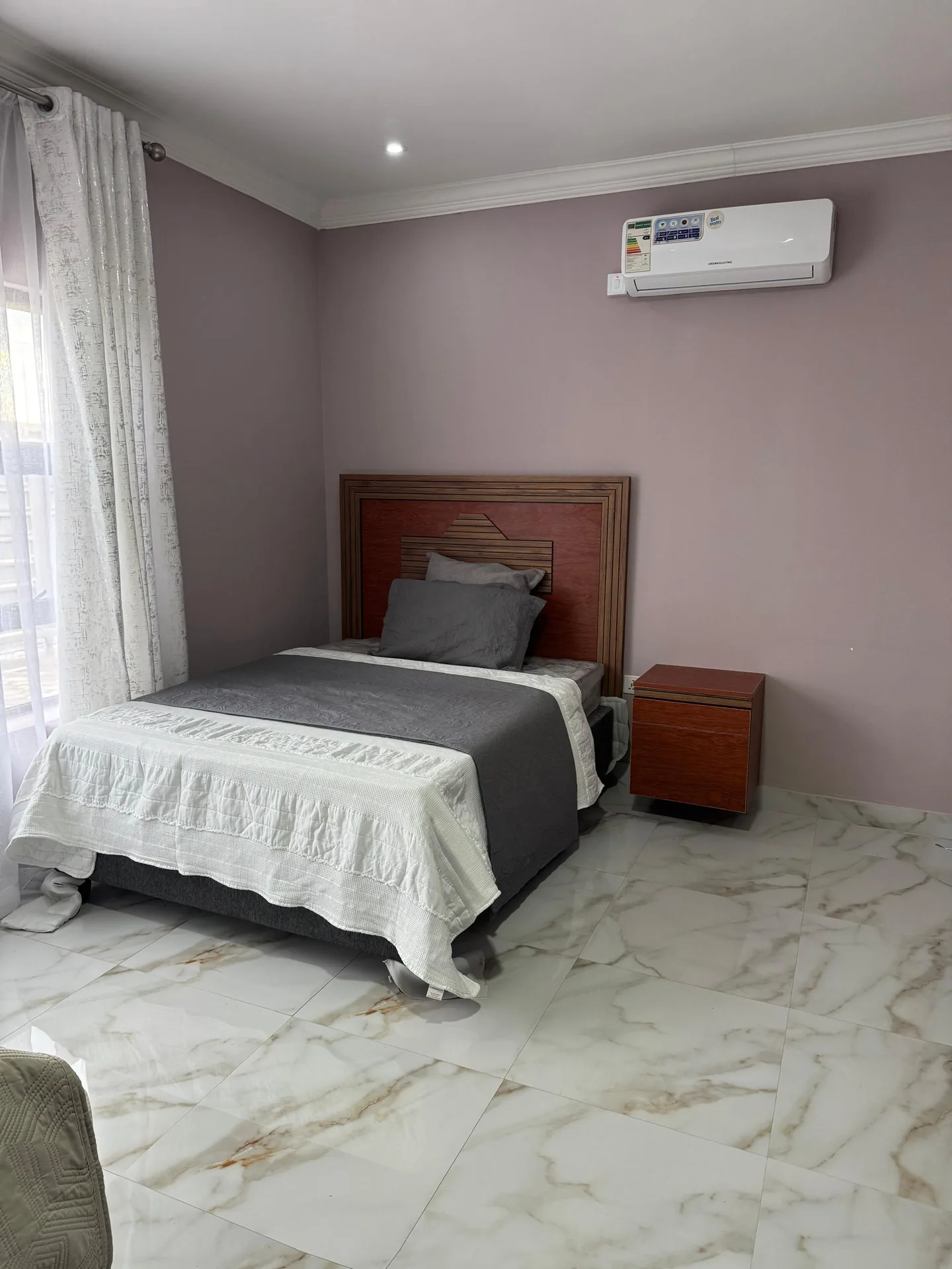 Shared master bedroom bed and headboard