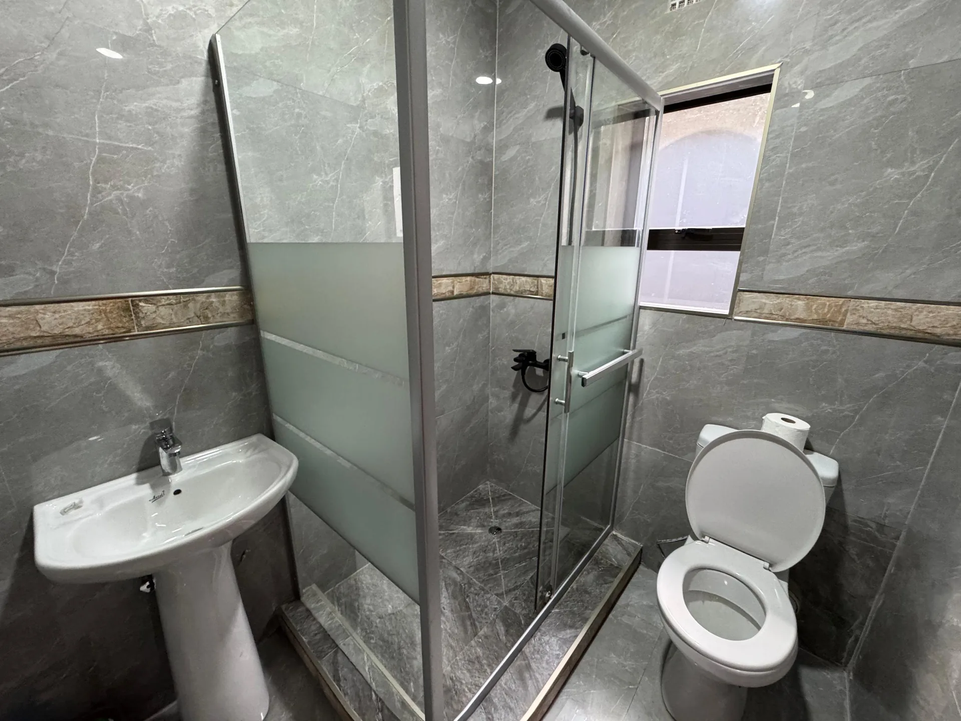 Private bathroom with shower and tub